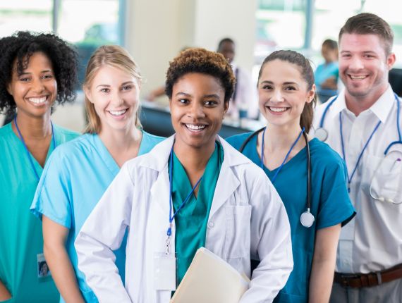 Healthcare professional conducting patient assessment at home